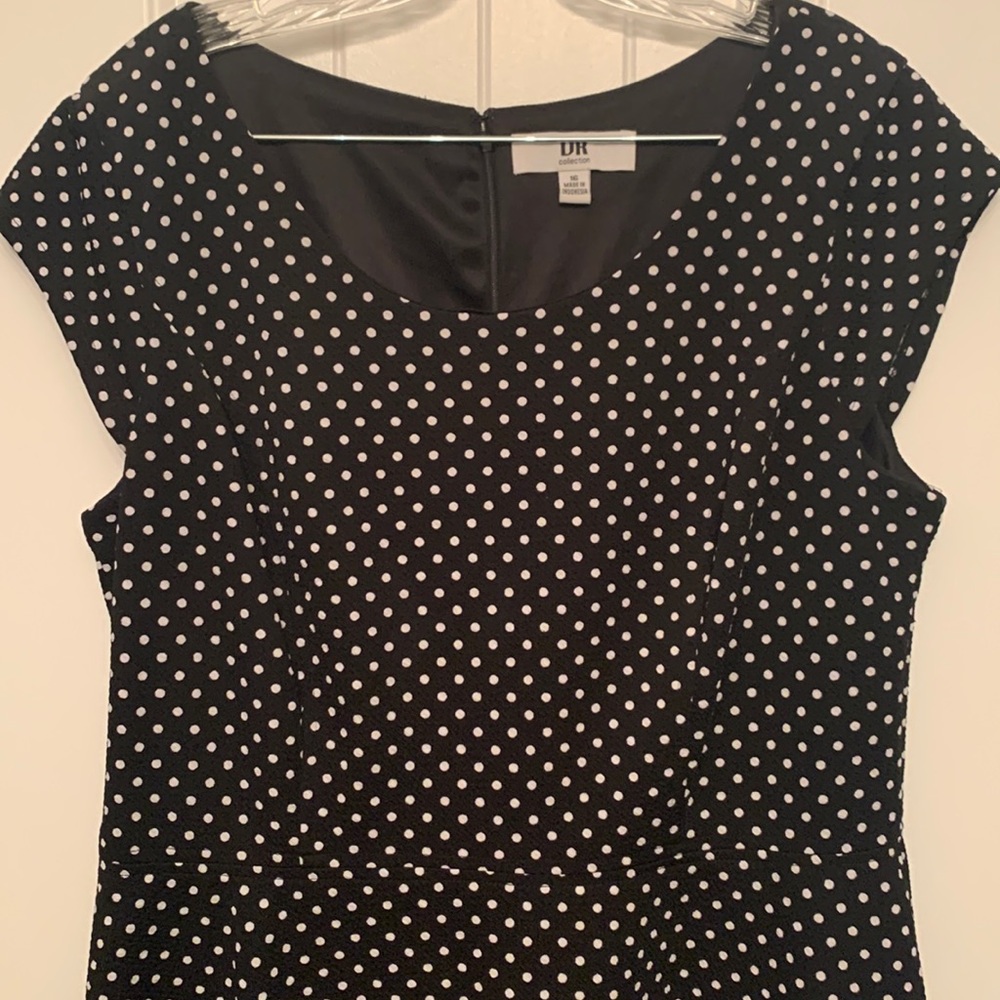 Black fit and flare dress with white polka dots